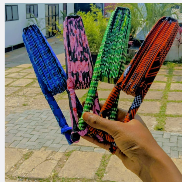 Authentic African fashion with vibrant fabrics, bold prints, and handmade clothing and accessories inspired by traditional culture.