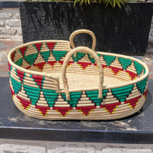 Beautiful handmade baby basket crafted from natural raffia